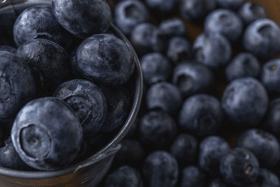 High angle view of blueberries in container