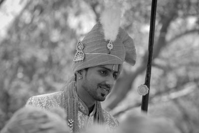 Portrait of young man wearing hat on his marriage