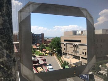 High angle view of buildings against sky