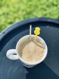 High angle view of coffee cup on table