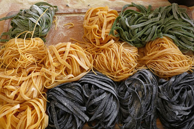 Close-up of raw pasta on table