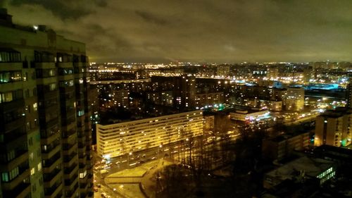 Illuminated cityscape at night