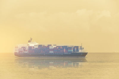 View of ship in sea against sky