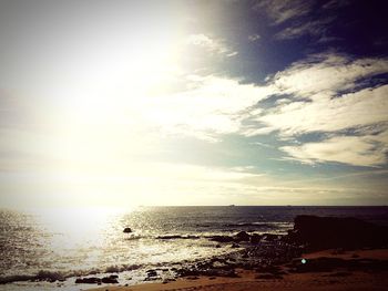 Scenic view of sea at sunset