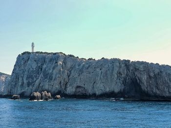 Scenic view of sea against clear blue sky