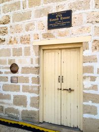 Information sign on brick wall