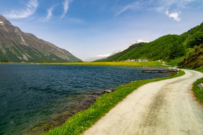 Upper engadine, lake sils, and the village of isola, photographed from above in summer.