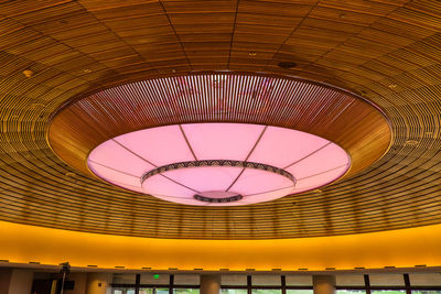 Low angle view of illuminated ceiling at railroad station