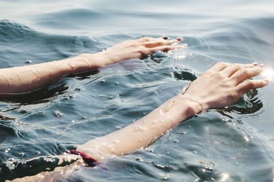 Woman swimming in sea