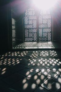 Sun shining through built structure