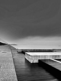 Pier over sea against sky