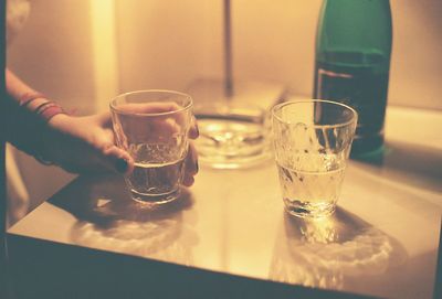 Close-up of beer glass on table