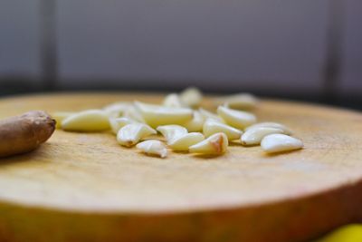 Close-up of garlic on cutting board