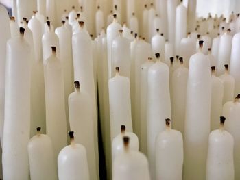 Close-up of white candles