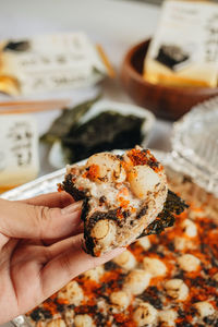 Close-up of hand holding ice cream