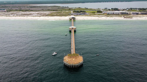 High angle view of sea amidst buildings