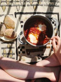 Midsection of woman holding food