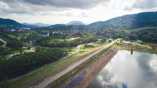 High angle view of road amidst mountains against sky