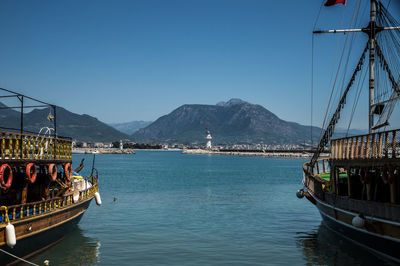 Boats moored in sea