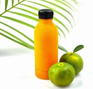 Close-up of green fruits on table