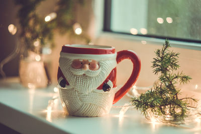 Close-up of coffee cup on table