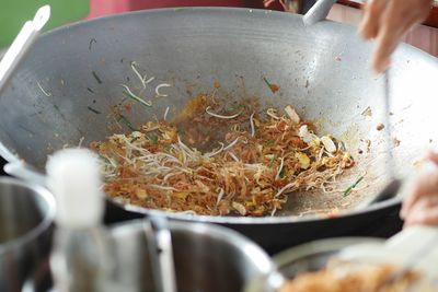 Close-up of man preparing food