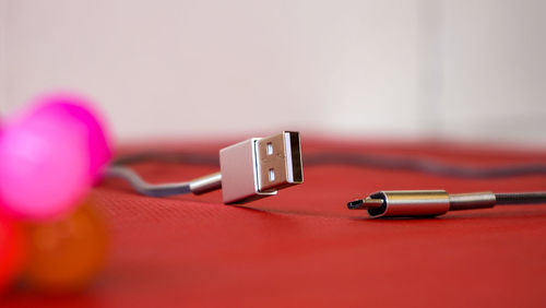 Close-up of telephone on table