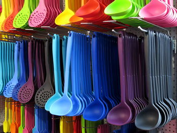 Colorful spoons for sale at market