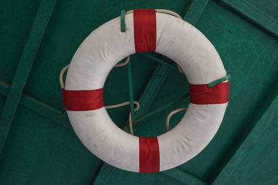 Close-up of tube tied with rope