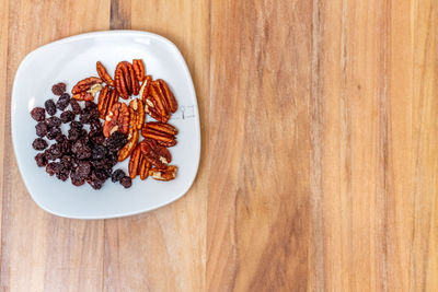 High angle view of fruit salad in plate on table