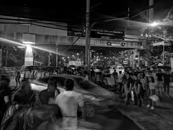 People on street at night