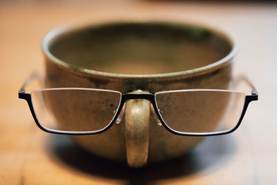 Close-up of sunglasses on table