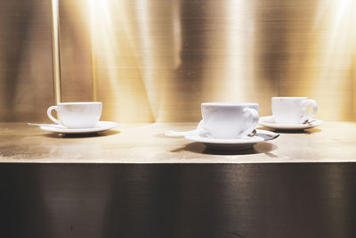 Coffee cup on table in cafe