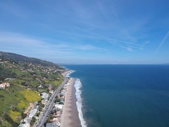 High angle view of beach against blue sky