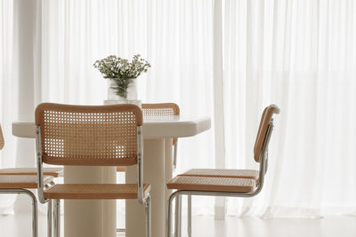 Empty chairs and table at home