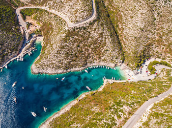 Aerial view of sea and landscape against sky