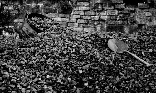 High angle view of stone on wall