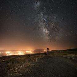 Scenic view of sea against sky at night