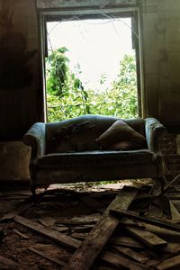 View of bed through window at home