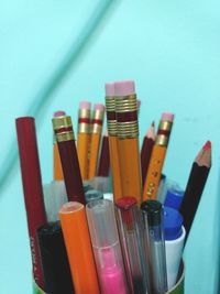 Close-up of multi colored pencils and pen