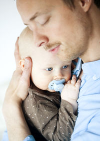 Father hugging baby