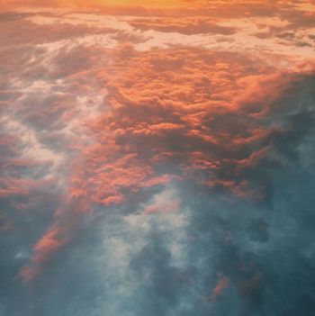 Low angle view of clouds in sky during sunset