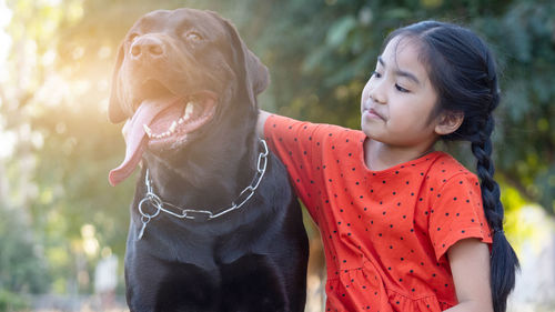 Portrait of a girl with dog