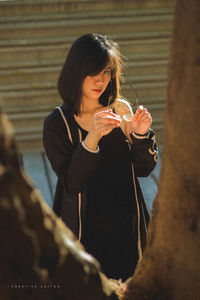 Woman holding ice cream cone