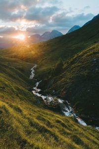 Scenic view of landscape against sky during sunset