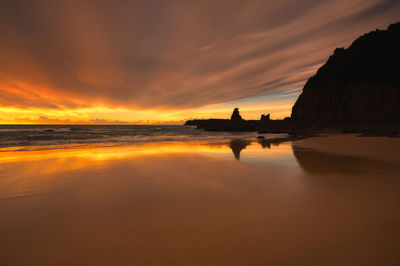 Scenic view of sea against sky during sunset