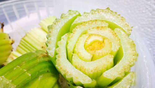 Close-up of lemon slice in plate