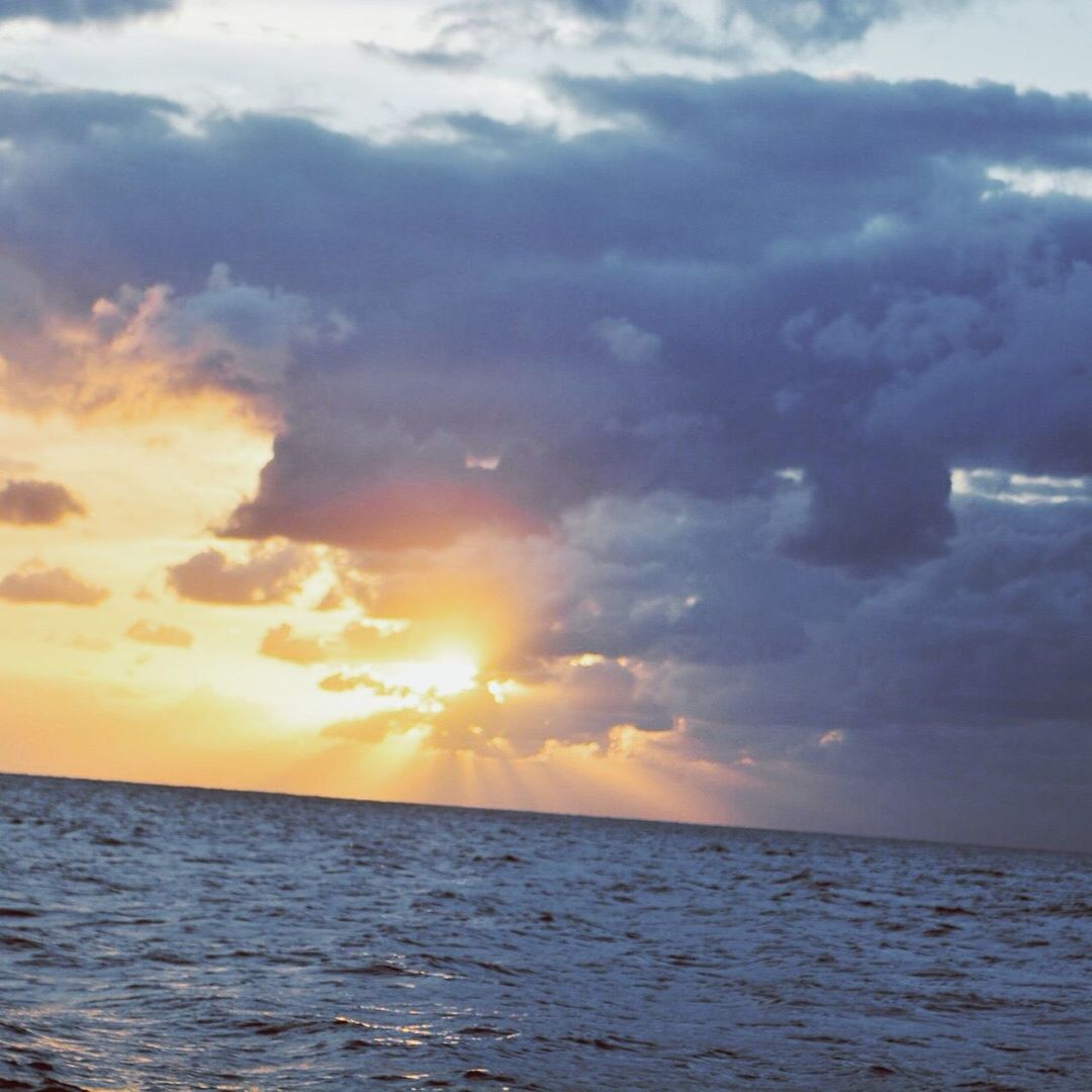 sea, horizon over water, water, sunset, sky, scenics, tranquil scene, beauty in nature, tranquility, cloud - sky, waterfront, idyllic, nature, cloud, cloudy, sun, orange color, seascape, outdoors, dramatic sky