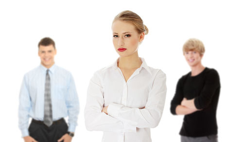 Portrait of friends standing against white background