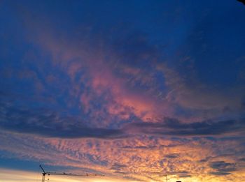 Low angle view of cloudy sky during sunset